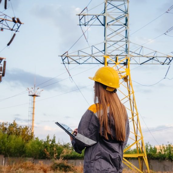 Woman next to power lines